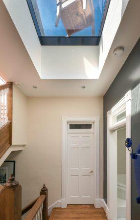 Series 2000 Walkable Skylight from underneath with chair