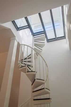 glass ceiling by stairs