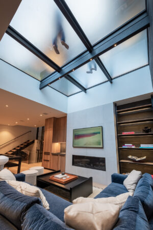  A living room with a walkable glass ceiling.